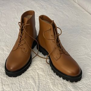 Brand new , booties, size 7 1/2 JCrew. Upper leather , synthetic lug sole.